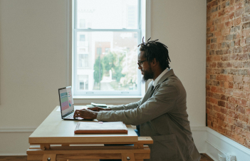 man working at a laptop